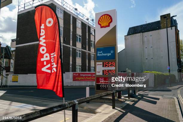 Prices on a totem sign at a Shell Plc petrol station in London, UK, on Wednesday, April 17, 2024. UK inflation slowed less than expected last month...