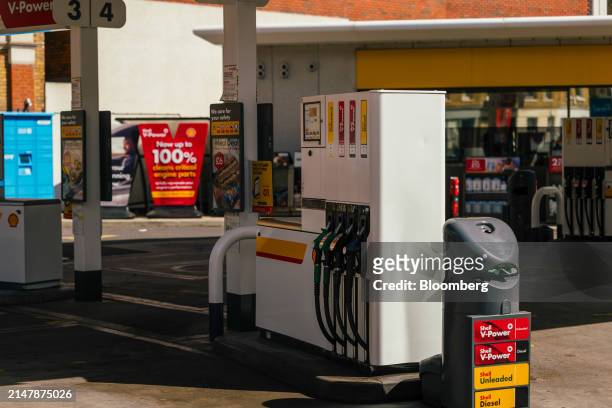 Fuel pumps at a Shell Plc petrol station in London, UK, on Wednesday, April 17, 2024. UK inflation slowed less than expected last month as fuel...
