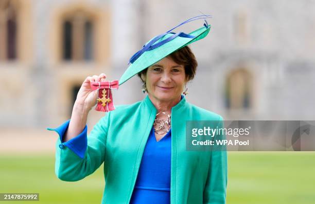 Elaine Bedell after being made an Officer of the Order of the British Empire at an investiture ceremony at Windsor Castle on April 17, 2024 in...