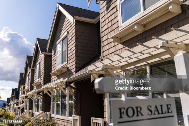 For Sale" sign in front of a home in the Issaquah Highlands area of Issaquah, Washington, US, on Tuesday, April 16, 2024. The National Association of...