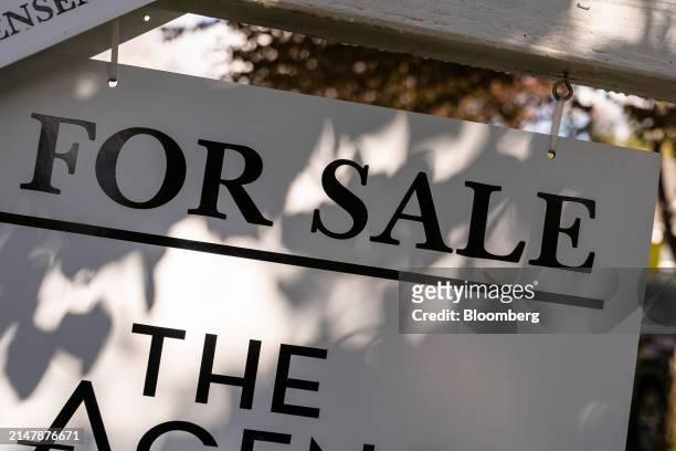 For Sale" sign in front of a home in the Issaquah Highlands area of Issaquah, Washington, US, on Tuesday, April 16, 2024. The National Association of...
