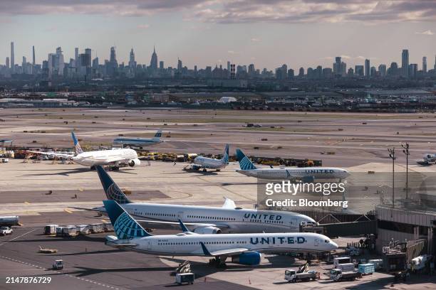 United Airlines planes at Newark Liberty International Airport in Newark, New Jersey, US, on Tuesday, March 19, 2024. United Airlines Holdings Inc.'s...