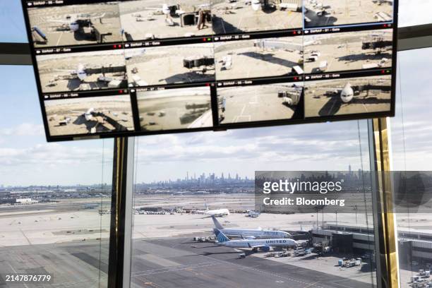 Screen in the United Airlines Station Operation Center at Newark Liberty International Airport in Newark, New Jersey, US, on Tuesday, March 19, 2024....
