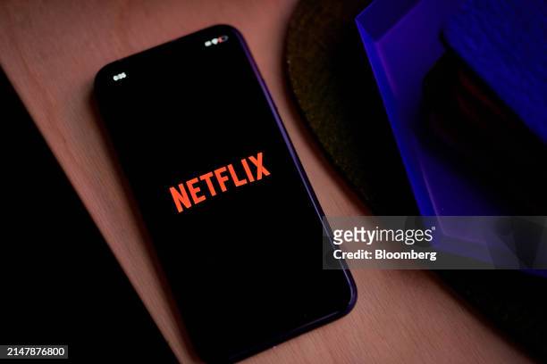 The Netflix logo on a smartphone arranged in the Queens borough of New York, US, on Tuesday, March 26, 2024. Netflix Inc. Is scheduled to release...