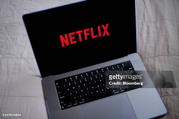 The Netflix logo on a laptop arranged in the Queens borough of New York, US, on Tuesday, March 26, 2024. Netflix Inc. Is scheduled to release...