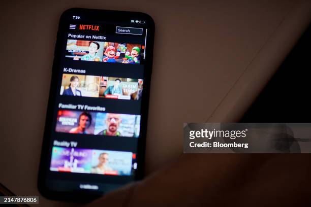 The Netflix app on a smartphone arranged in the Queens borough of New York, US, on Tuesday, March 26, 2024. Netflix Inc. Is scheduled to release...