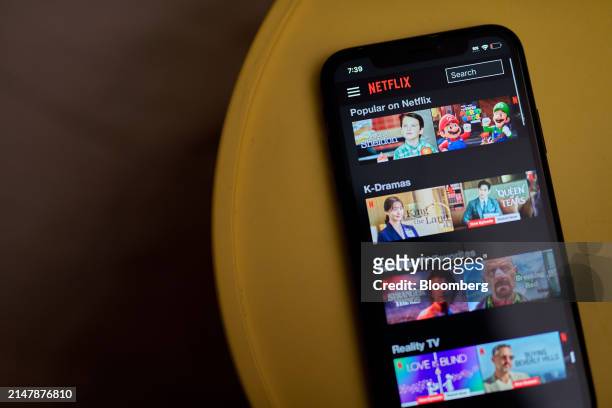 The Netflix app on a smartphone arranged in the Queens borough of New York, US, on Tuesday, March 26, 2024. Netflix Inc. Is scheduled to release...