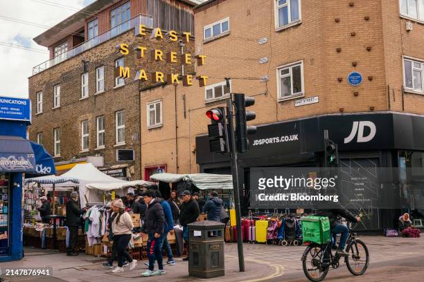 An entrance to East Street Market in London, UK, on Wednesday, April 17, 2024. UK inflation slowed less than expected last month as fuel prices crept...