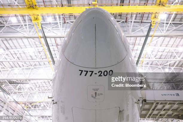 The nose of a Boeing 777-200 airplane in a United Airlines maintenance hangar at Newark Liberty International Airport in Newark, New Jersey, US, on...