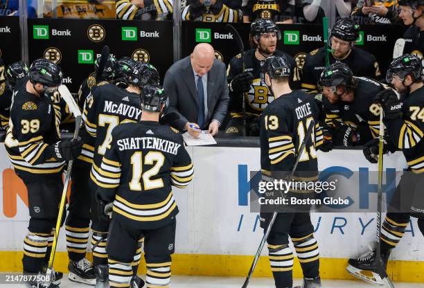 Boston, MA Boston Bruins head coach Jim Montgomery drawing up a play in the third period.