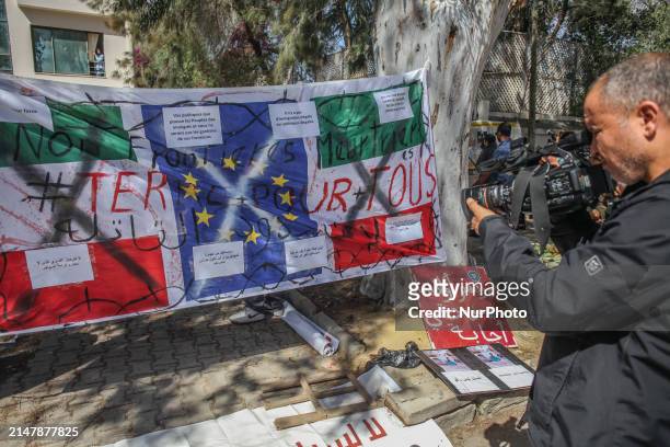 Large banner featuring the 12 gold stars of the European flag is being displayed in front of the Italian Embassy in Tunis, Tunisia, on April 17...