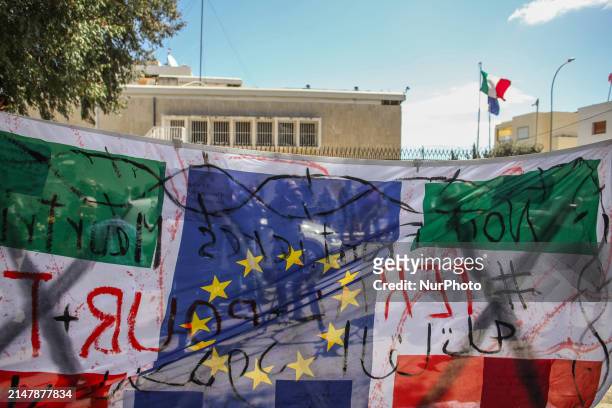 Large banner featuring the 12 gold stars of the European flag is being displayed in front of the Italian Embassy in Tunis, Tunisia, on April 17...