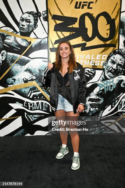 Maycee Barber poses in front of the UFC 300 mural backstage during UFC 300 at T-Mobile Arena on April 13, 2024 in Las Vegas, Nevada.