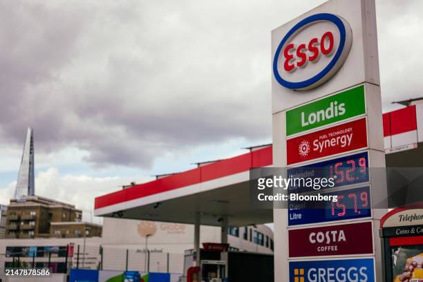 Fuel prices on a totem sign at an Esso petrol station in London, UK, on Wednesday, April 17, 2024. UK inflation slowed less than expected last month...