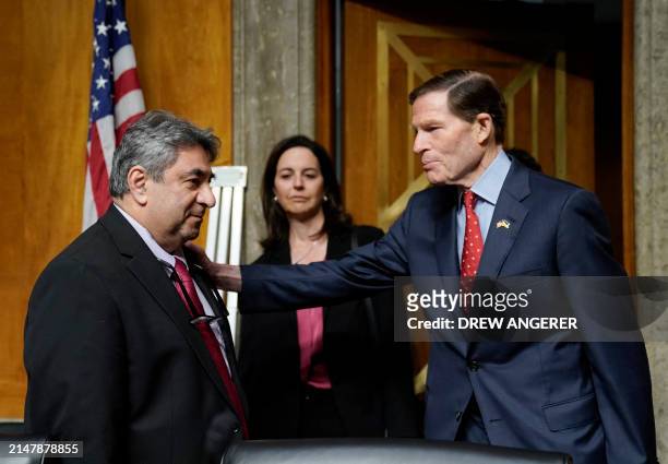 Senator Richard Blumenthal greets Boeing engineer Sam Salehpour as he arrives to testify before the US Senate Homeland Security and Governmental...
