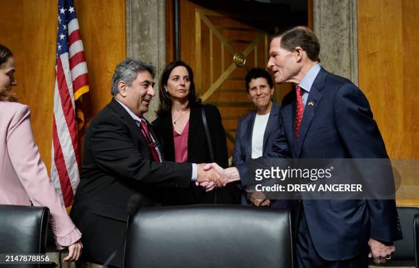 Senator Richard Blumenthal greets Boeing engineer Sam Salehpour as he arrives to testify before the US Senate Homeland Security and Governmental...