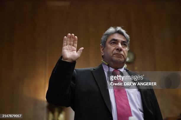 Boeing engineer Sam Salehpour is swearing in before the US Senate Homeland Security and Governmental Affairs Subcommittee on Investigations before...