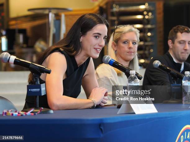 Caitlin Clark of the Indiana Fever talks to the media during an introductory press conference on April 17, 2024 at Gainbridge Fieldhouse in...