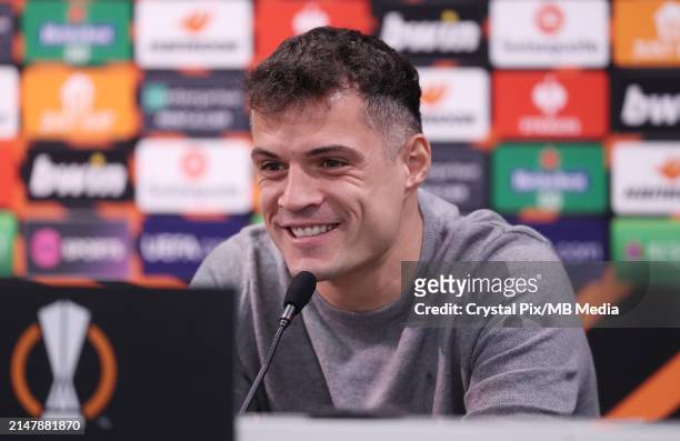 Granit Xhaka of Bayer 04 Leverkusen during the pre match press conference ahead of their UEFA Europa League 2023/24 Quarter-Final second leg match...