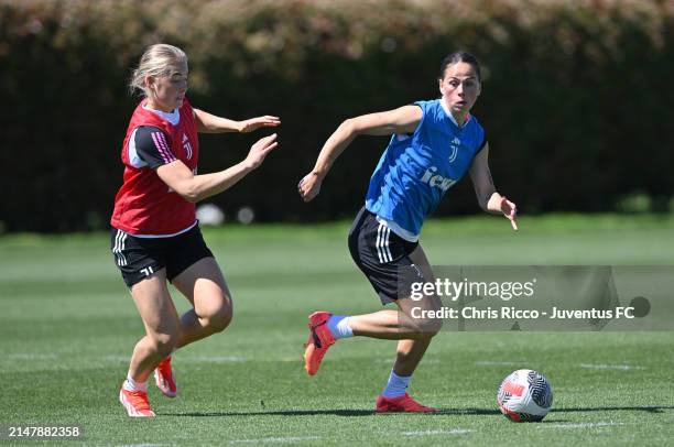 Sara Björk Gunnarsdóttir of Juventus Women evades challenge from Paulina Nyström of Juventus during the Juventus Women Training Session at Juventus...