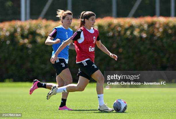 Sofia Cantore of Juventus Women evades challenge from Cristiana Girelli of Juventus Women during the Juventus Women Training Session at Juventus...