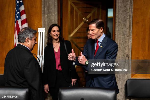 Boeing engineer Sam Salehpour greets chairman Sen. Richard Blumenthal before the start of a Senate Homeland Security and Governmental Affairs...