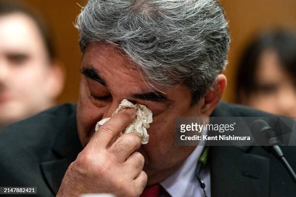 Boeing engineer Sam Salehpour wipes his eyes during a Senate Homeland Security and Governmental Affairs subcommittee on investigations hearing titled...