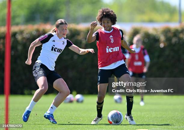 Sara Gama of Juventus Women evades challenge from Elsa Pelgander during the Juventus Women Training Session at Juventus Centre, Vinovo on April 17,...