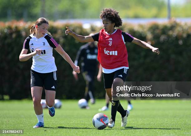 Sara Gama of Juventus Women evades challenge from Elsa Pelgander during the Juventus Women Training Session at Juventus Centre, Vinovo on April 17,...