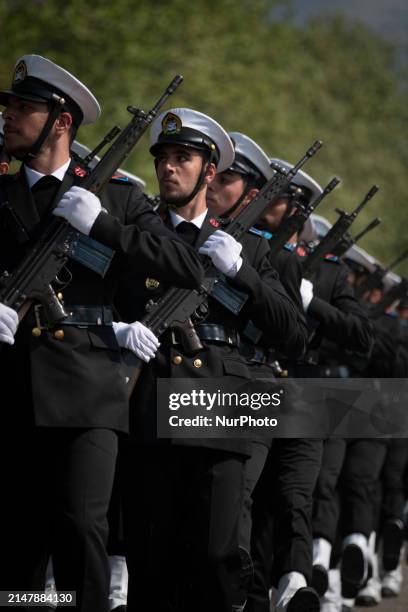 Members of the Iranian navy are marching in a military parade to mark the anniversary of Iran's Army Day at an Army military base in Tehran, Iran, on...