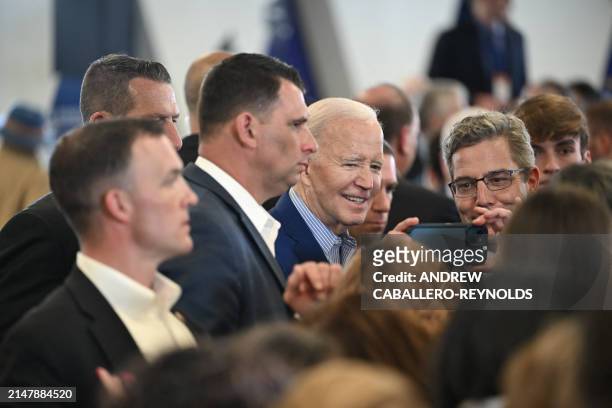 President Joe Biden greets attendees after speaking at an event at the United Steelworkers Headquarters in Pittsburgh, Pennsylvania, on April 17,...
