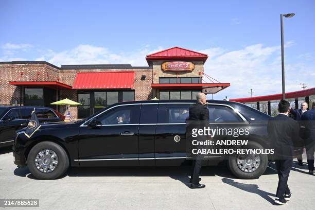 The presidential limousine with US President Joe Biden onboard is seen outside a Sheetz gas station in Pittsburgh, Pennsylvania, on April 17, 2024....