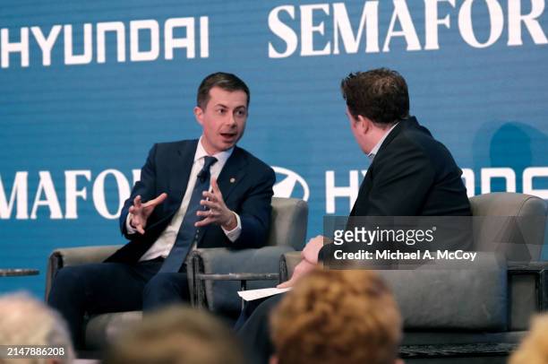 Secretary of Transportation Pete Buttigieg, and Ben Smith, Co-Founder and Editor-In-Chief of Semafor, speak during a chat at The Semafor 2024 World...