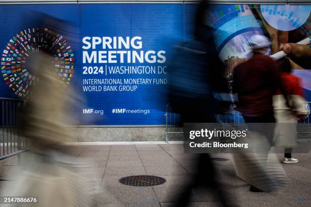 International Monetary Fund and World Bank spring meetings signage outside the IMF headquarters in Washington, DC, US, on Wednesday, April 17, 2024....