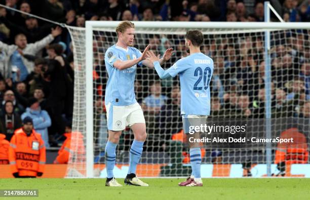 Manchester City's Kevin De Bruyne celebrates with team-mate Bernardo Silva after scoring his side's equalising goal to make the score 1 -1 during the...