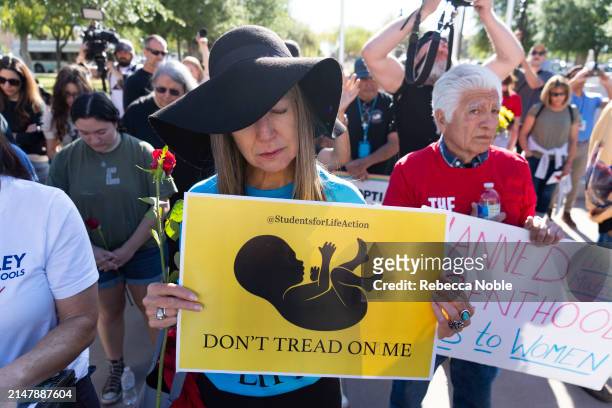 Anti-abortion advocates demonstrate prior to an Arizona House of Representatives session at the Arizona State Capitol on April 17, 2024 in Phoenix,...