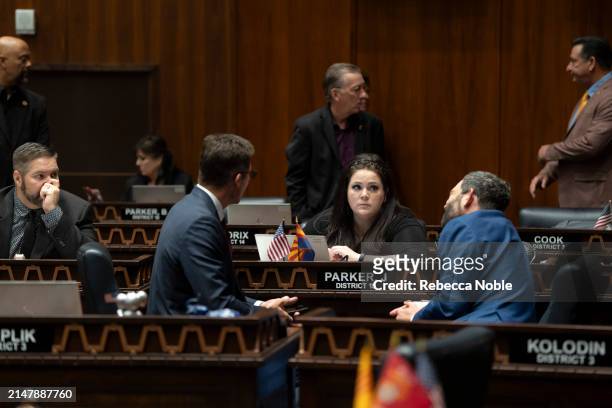 Arizona State Reps. Joseph Chaplik, Jacqueline Parker and Alex Kolodin speak during a legislative session at the Arizona House of Representatives on...