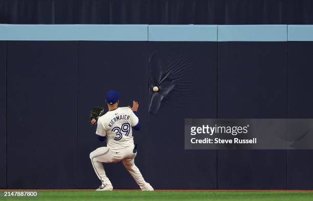 Toronto Blue Jays outfielder Kevin Kiermaier cannot track down a New York Yankees outfielder Juan Soto RBI double in the fifth inning as the Toronto...