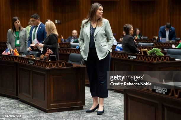 Arizona State Rep. Stephanie Stahl Hamilton looks at her Republican colleagues during a legislative session at the Arizona House of Representatives...