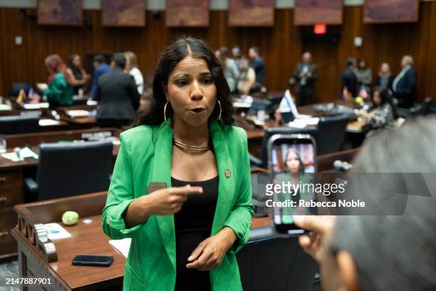 Arizona State Rep. Analise Ortiz fills a video during a legislative session at the Arizona House of Representatives on April 17, 2024 in Phoenix,...