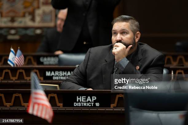 Arizona State Rep. And Republican candidate for Maricopa County Recorder Justin Heap listens during a legislative session at the Arizona House of...