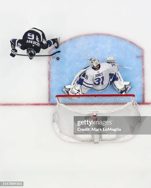 Nikita Kucherov of the Tampa Bay Lightning scores against goalie Martin Jones of the Toronto Maple Leafs during the first period at Amalie Arena on...