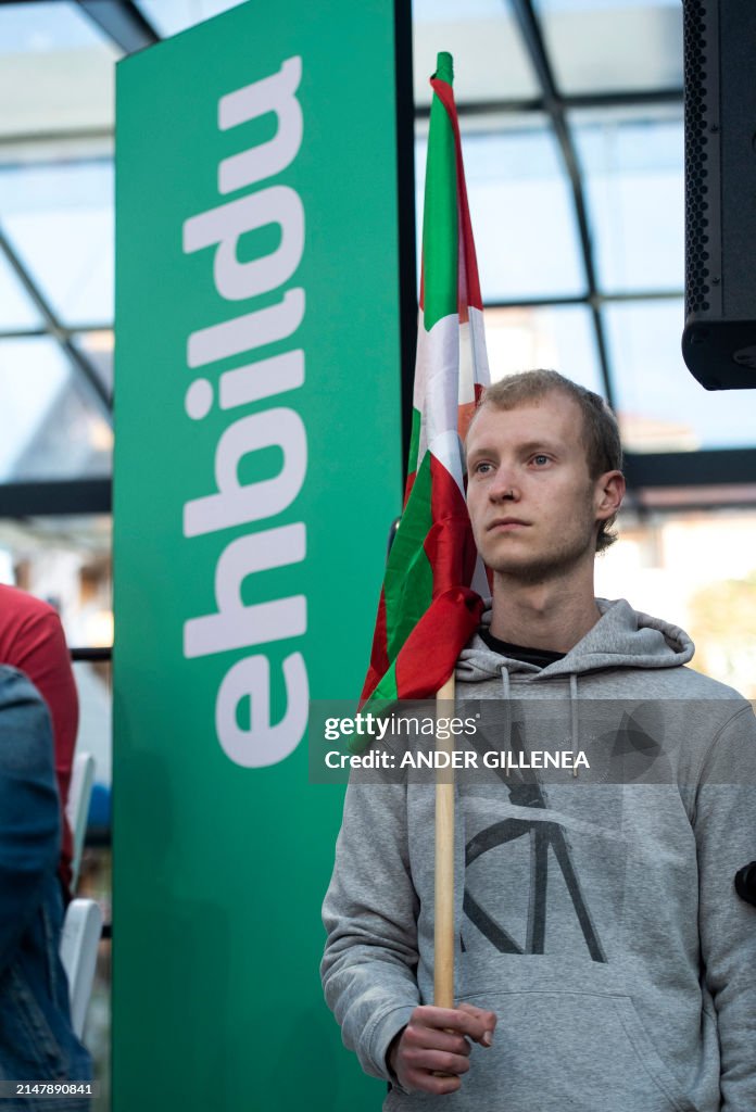 Basque Press A young man holds a Basque flag during a Pro-independence political ...