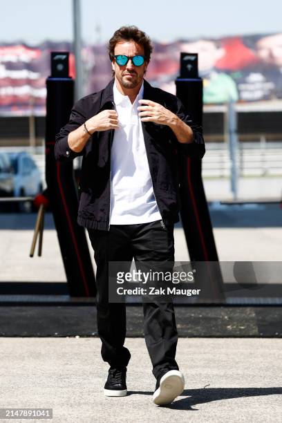Fernando Alonso, Aston Martin F1 Team, arrives at the track during previews ahead of the F1 Grand Prix of China at Shanghai International Circuit on...