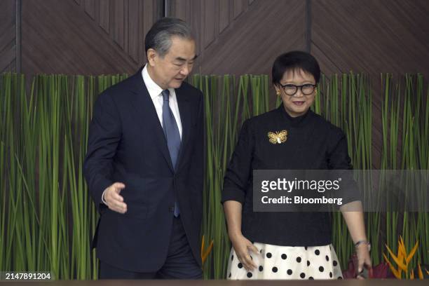 Wang Yi, China's foreign minister, left, and Retno Marsudi, Indonesia's foreign affairs minister, ahead of a bilateral meeting in Jakarta, Indonesia,...