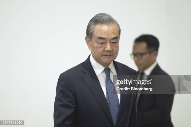 Wang Yi, China's foreign minister, arrives for a bilateral meeting with Retno Marsudi, Indonesia's foreign affairs minister, not photographed, in...