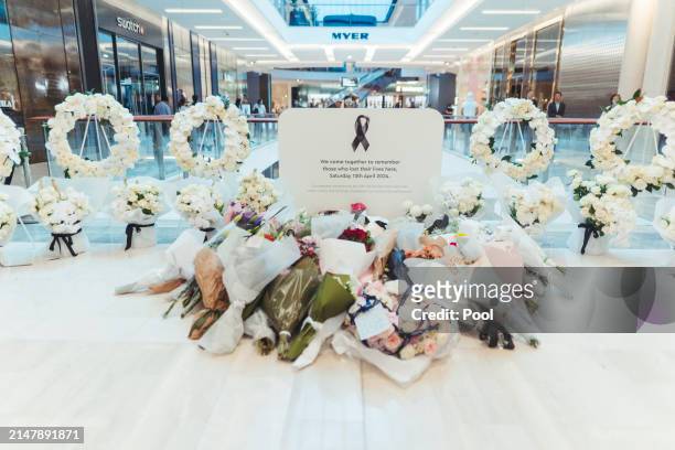Flowers are left at Westfield Bondi Junction during a day of reflection on April 18, 2024 in Bondi Junction, Australia. The Westfield Bondi Junction...