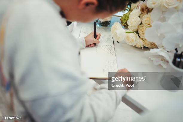 Members of the public pay their respects at Westfield Bondi Junction on a day of reflection on April 18, 2024 in Bondi Junction, Australia. The...