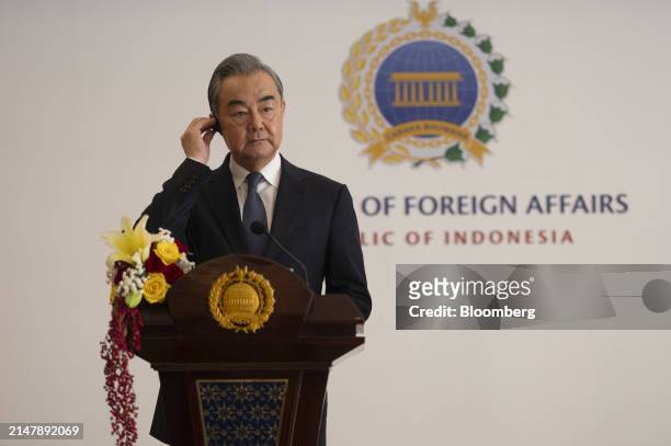 Wang Yi, China's foreign minister, attends a news conference with Retno Marsudi, Indonesia's foreign affairs minister, not photographed, in Jakarta,...