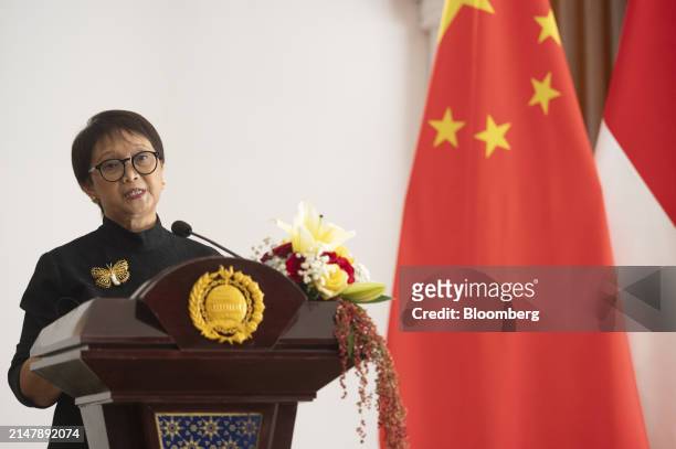 Retno Marsudi, Indonesia's foreign affairs minister, speaks during a news conference with Wang Yi, China's foreign minister, not photographed, in...
